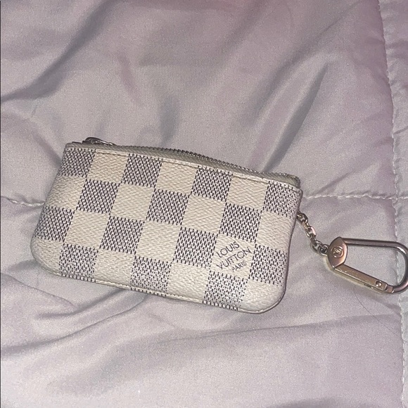 white keychain wallet